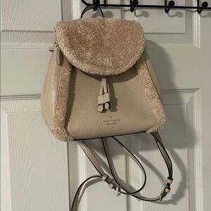 Kate Spade Leila Medium Flap Backpack with Faux Shearling.